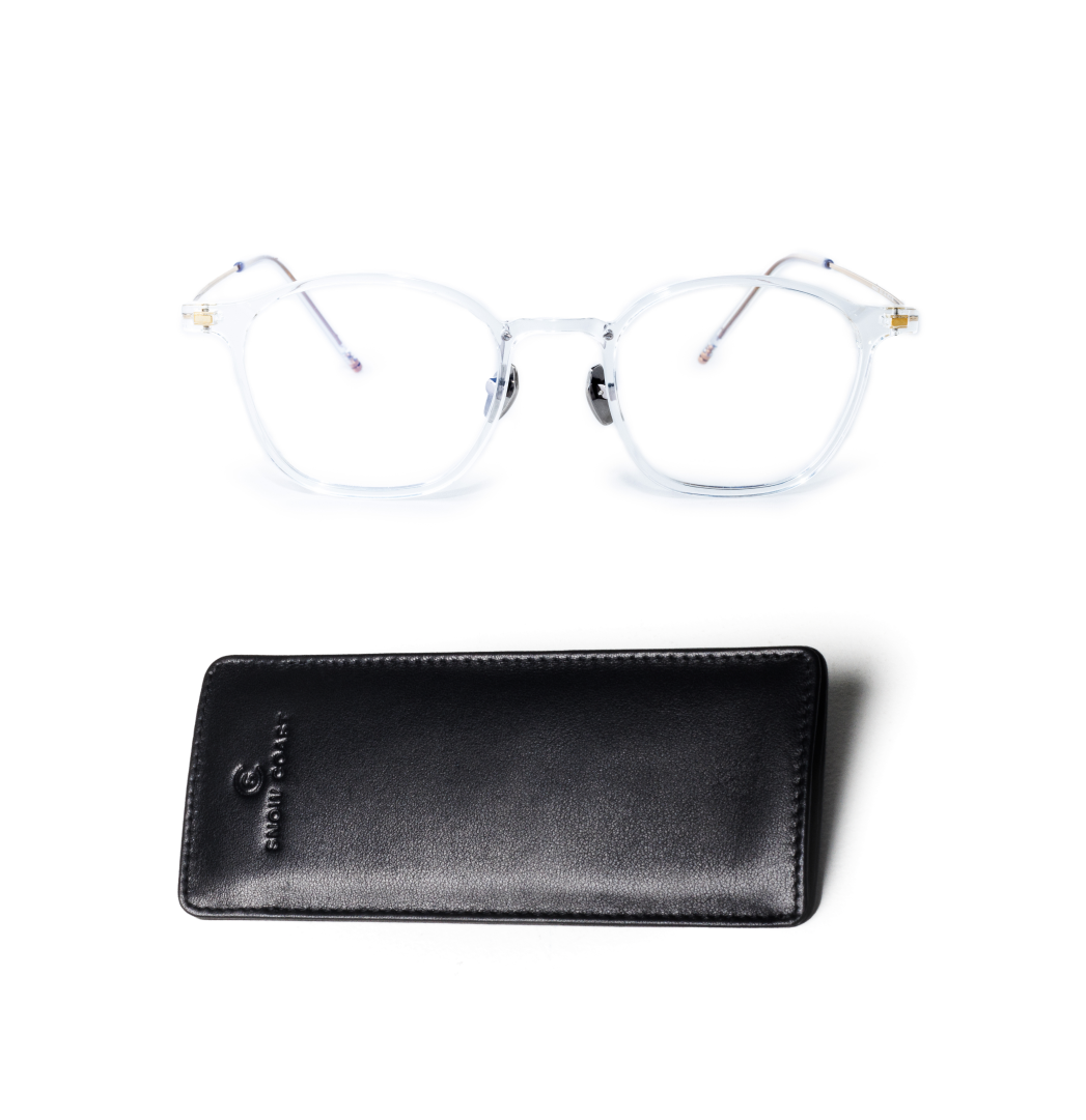 A pair of clear-framed eyeglasses with thin metal arms, shown with a black leather soft case.