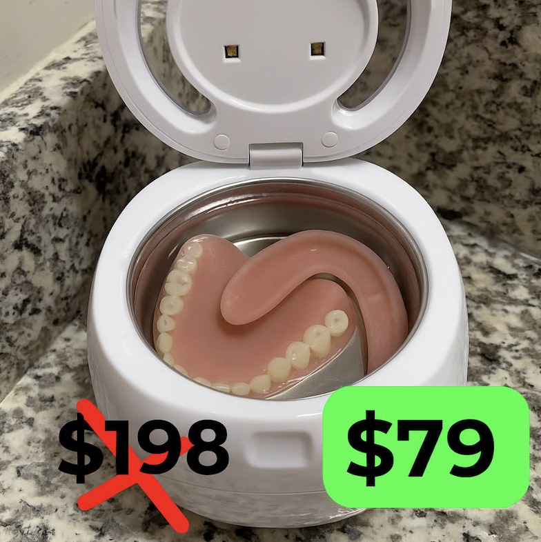 A set of dentures inside an open, white ultrasonic cleaning device, with a sale price graphic.