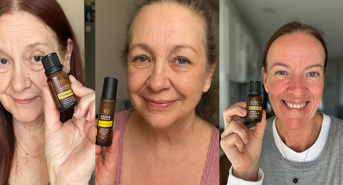 Three women holding Aura Cacia essential oil bottles, smiling at the camera.