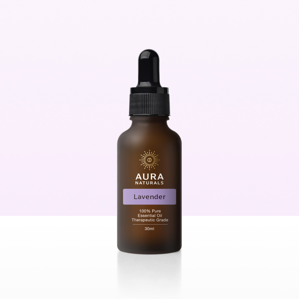 A brown dropper bottle of Aura Naturals Lavender essential oil against a light purple and white background.
