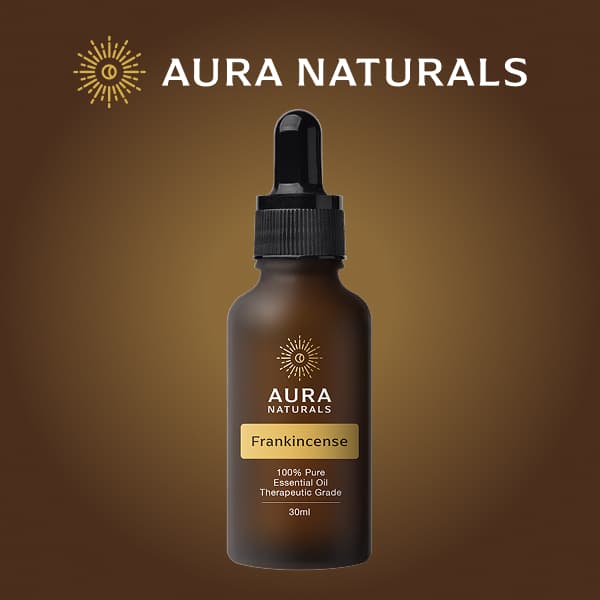Brown bottle of Aura Naturals Frankincense essential oil with dropper.