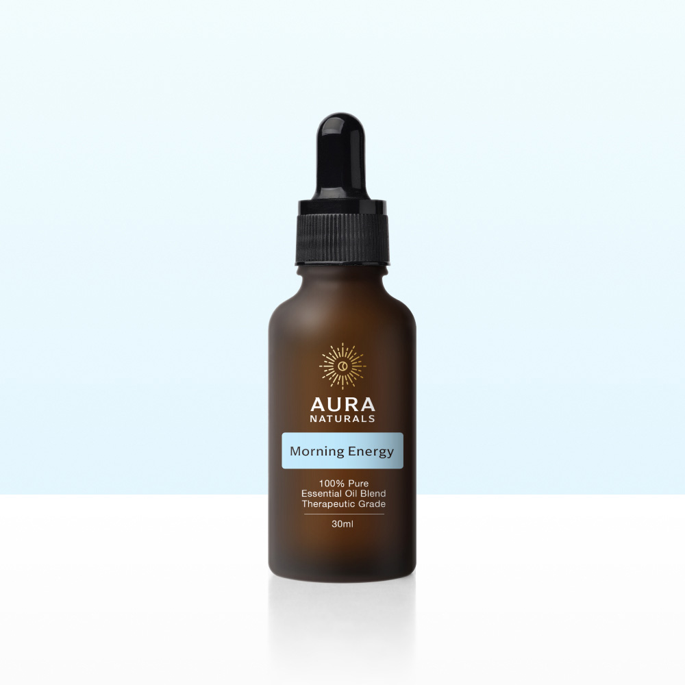 A brown dropper bottle of Aura Naturals Morning Energy essential oil blend against a light blue gradient background.
