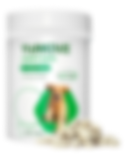 Blurry image of a white container with a green label and pills in front.