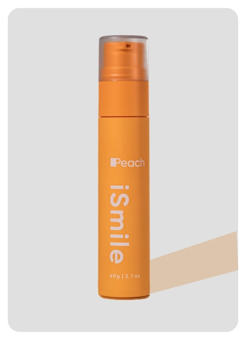 Orange bottle labeled 'iSmile' with a clear cap on a gray background.