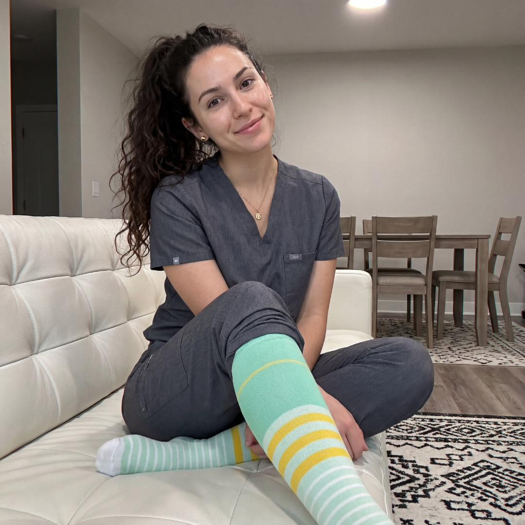 Customer in blue scrubs standing indoors near exercise equipment