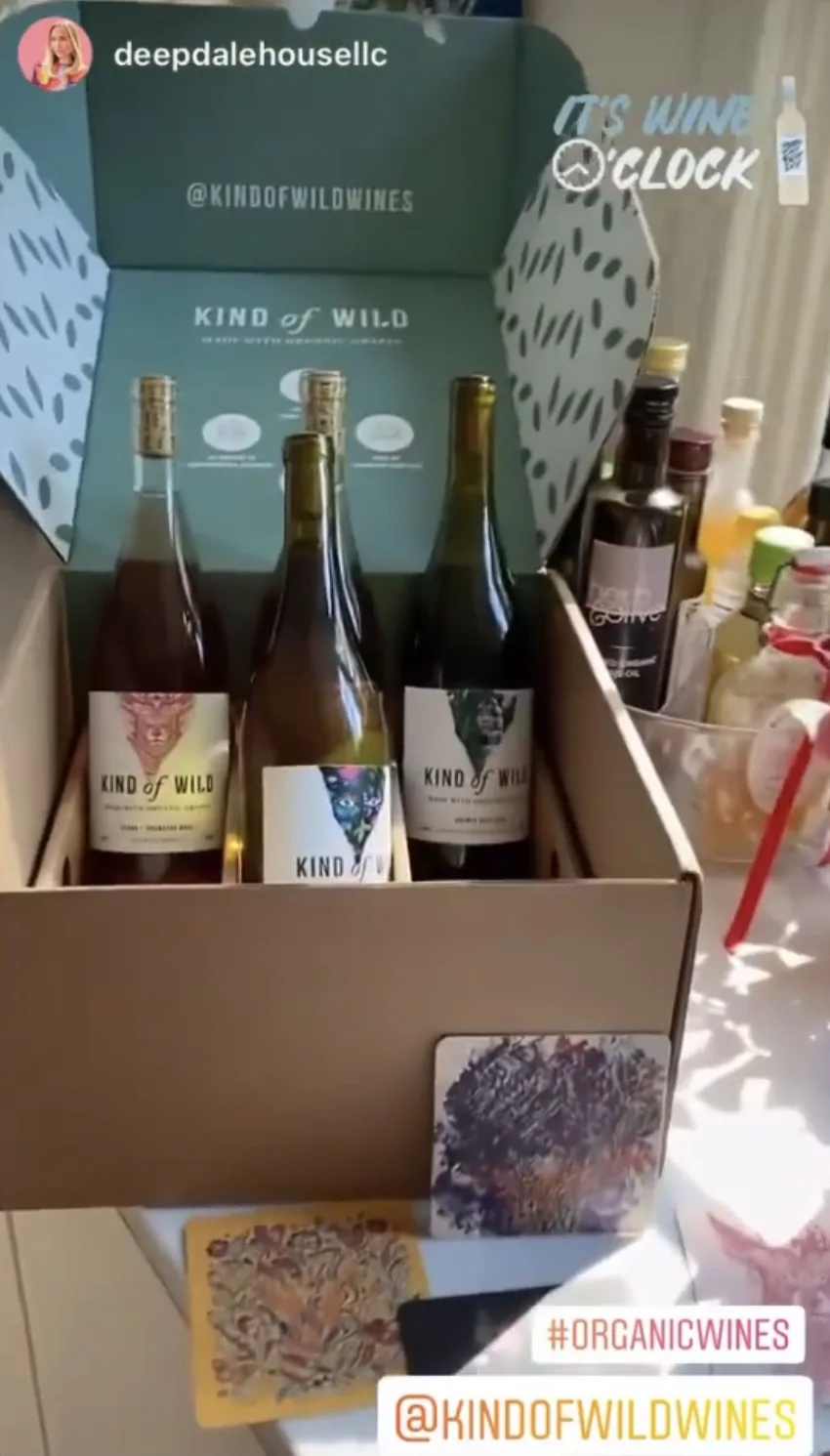Open box with three wine bottles, labeled 'Kind of Wild'.