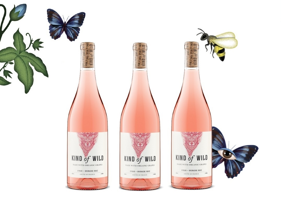 Three bottles of Kind of Wild rosé wine surrounded by illustrations of butterflies, a bee, and leaves.