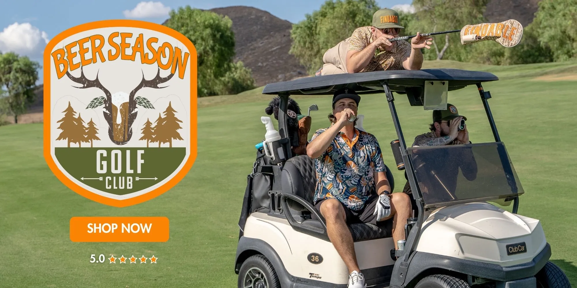 Golf cart with three people, two in Hawaiian shirts, on a golf course.