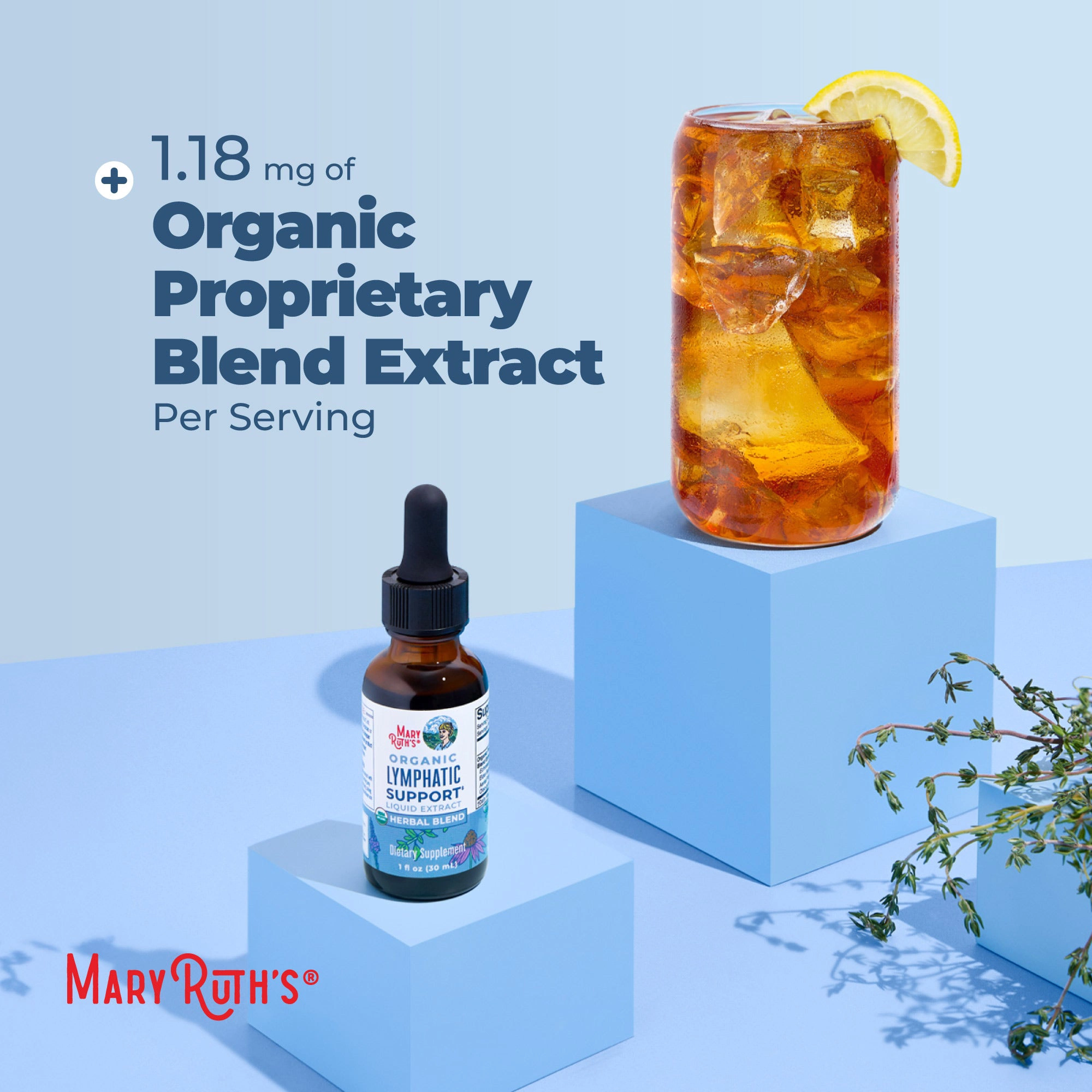 A bottle of Mary Ruth's Organic Lymphatic Support sits on a blue block next to iced tea.