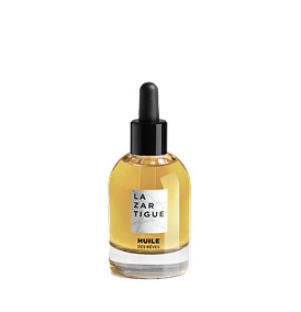 A bottle of Lazartigue hair oil with a dropper cap.