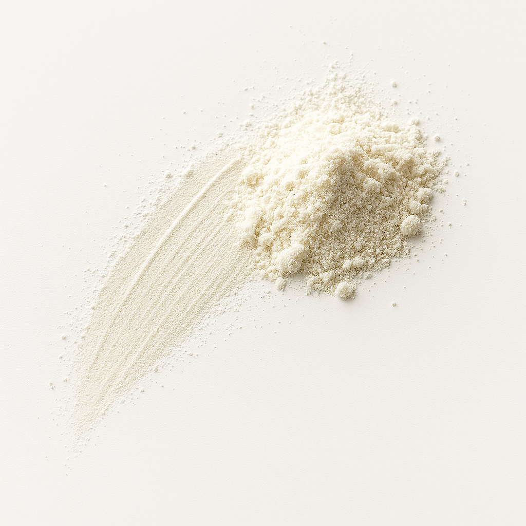A pile of fine white powder on a white surface.