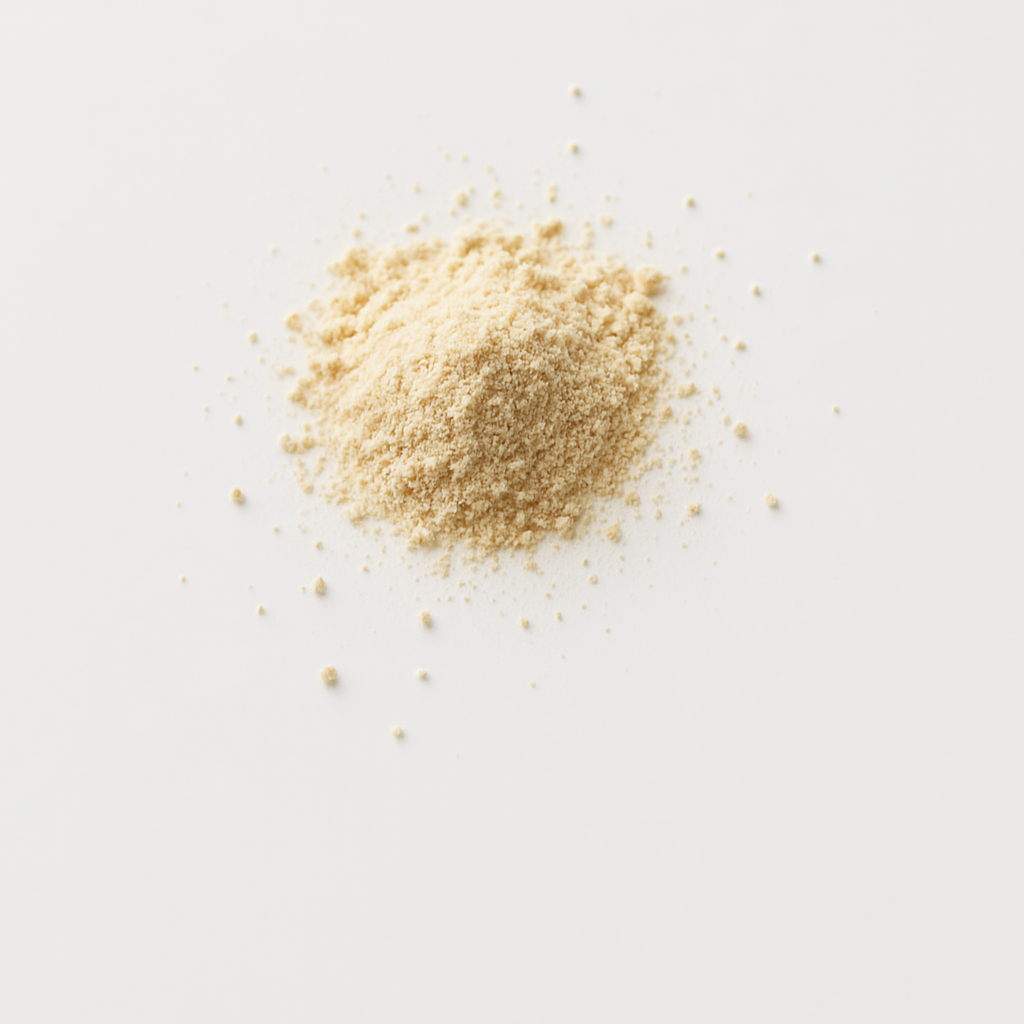 A small pile of beige powder on a white background.