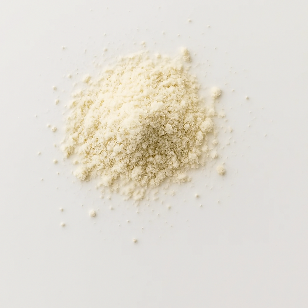 A pile of fine white powder on a white surface.