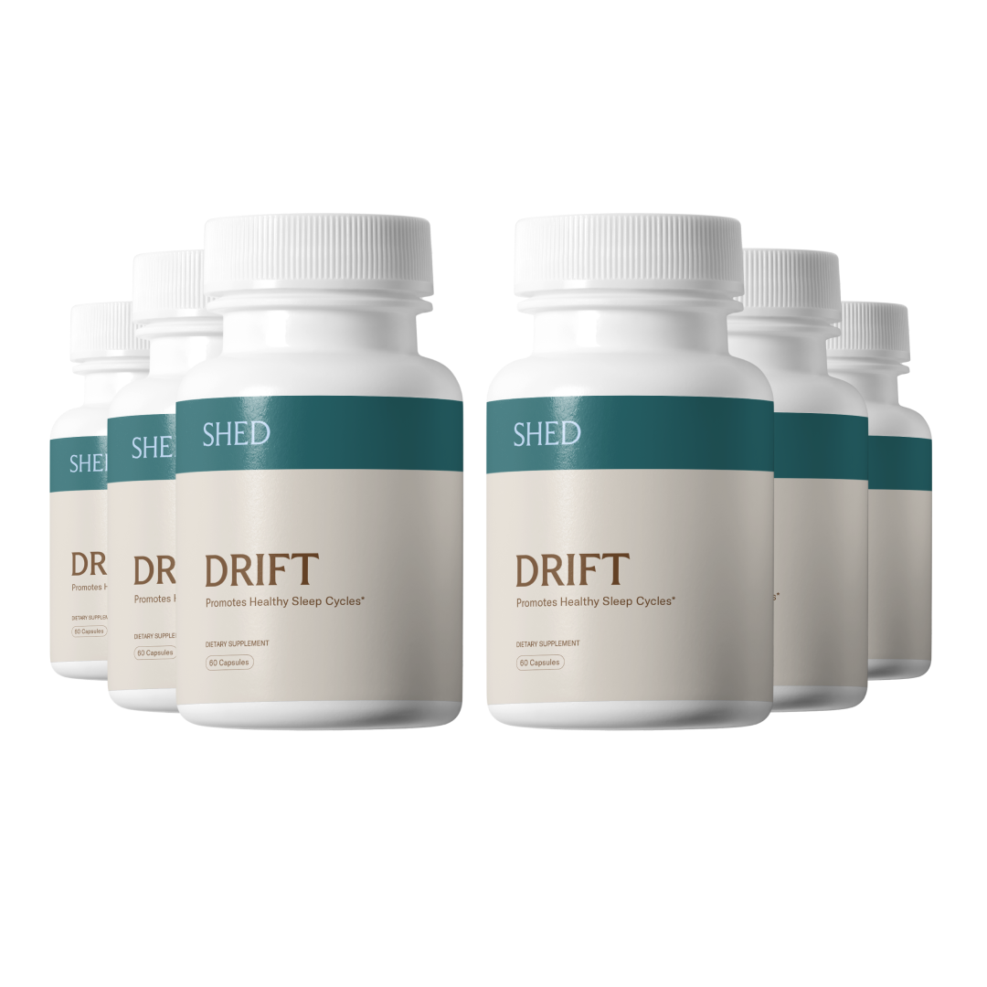 Six bottles of dietary supplement labeled 'DRIFT' for sleep cycles.