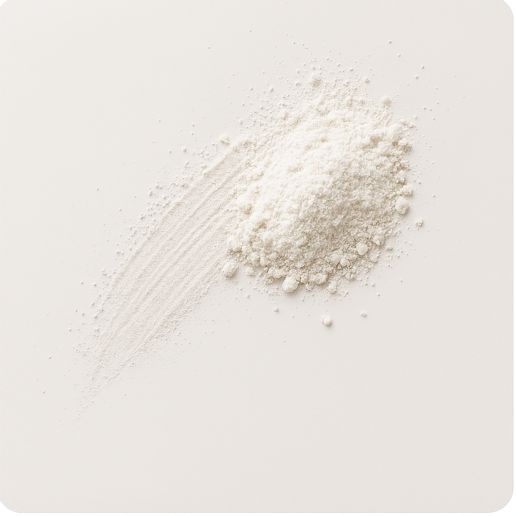 A pile of white powder on a white surface.