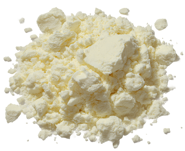 A top-down view of a pile of crumbly, off-white powder on a white background.