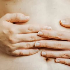 Hands on stomach