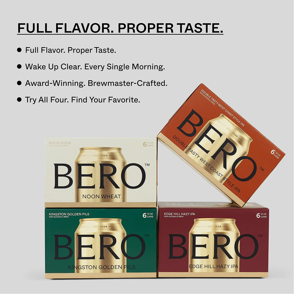An advertisement for BERO non-alcoholic brew, showing four different six-packs stacked together.