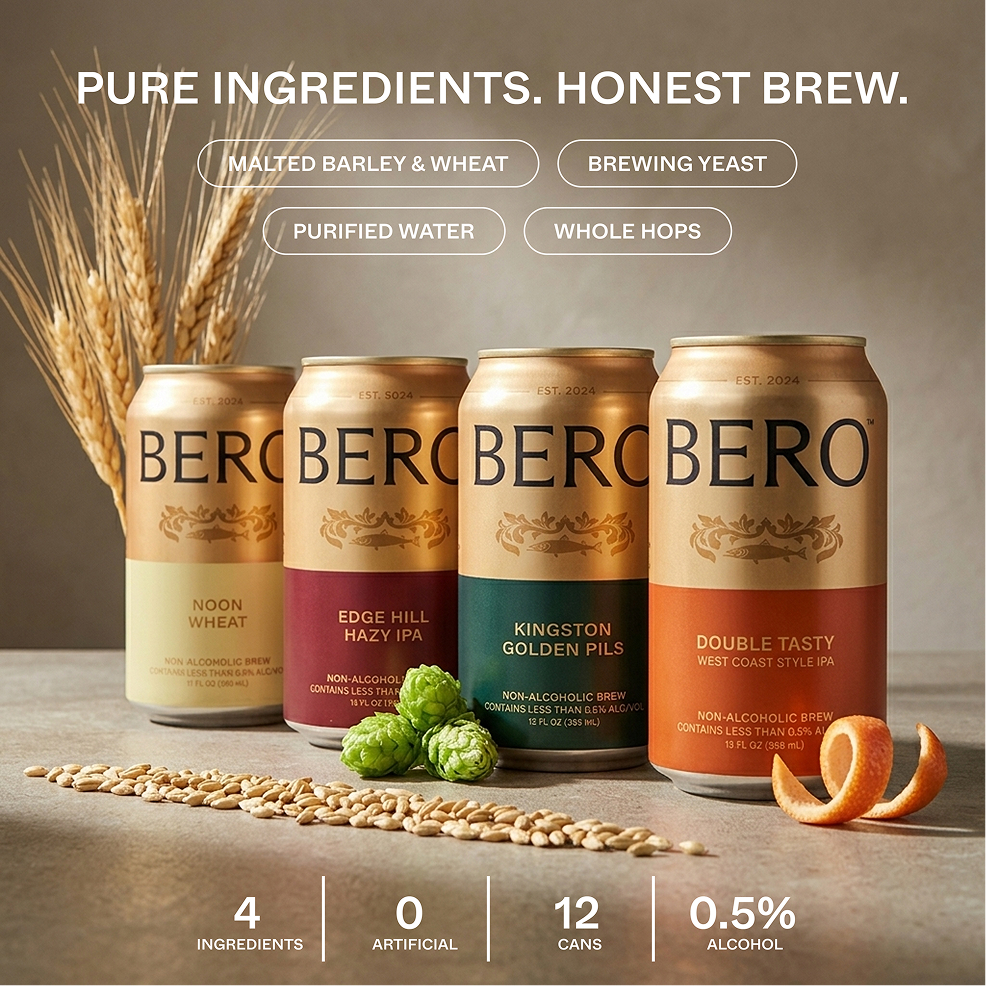 Four different cans of BERO non-alcoholic brew are arranged with raw ingredients like wheat, hops, and barley.