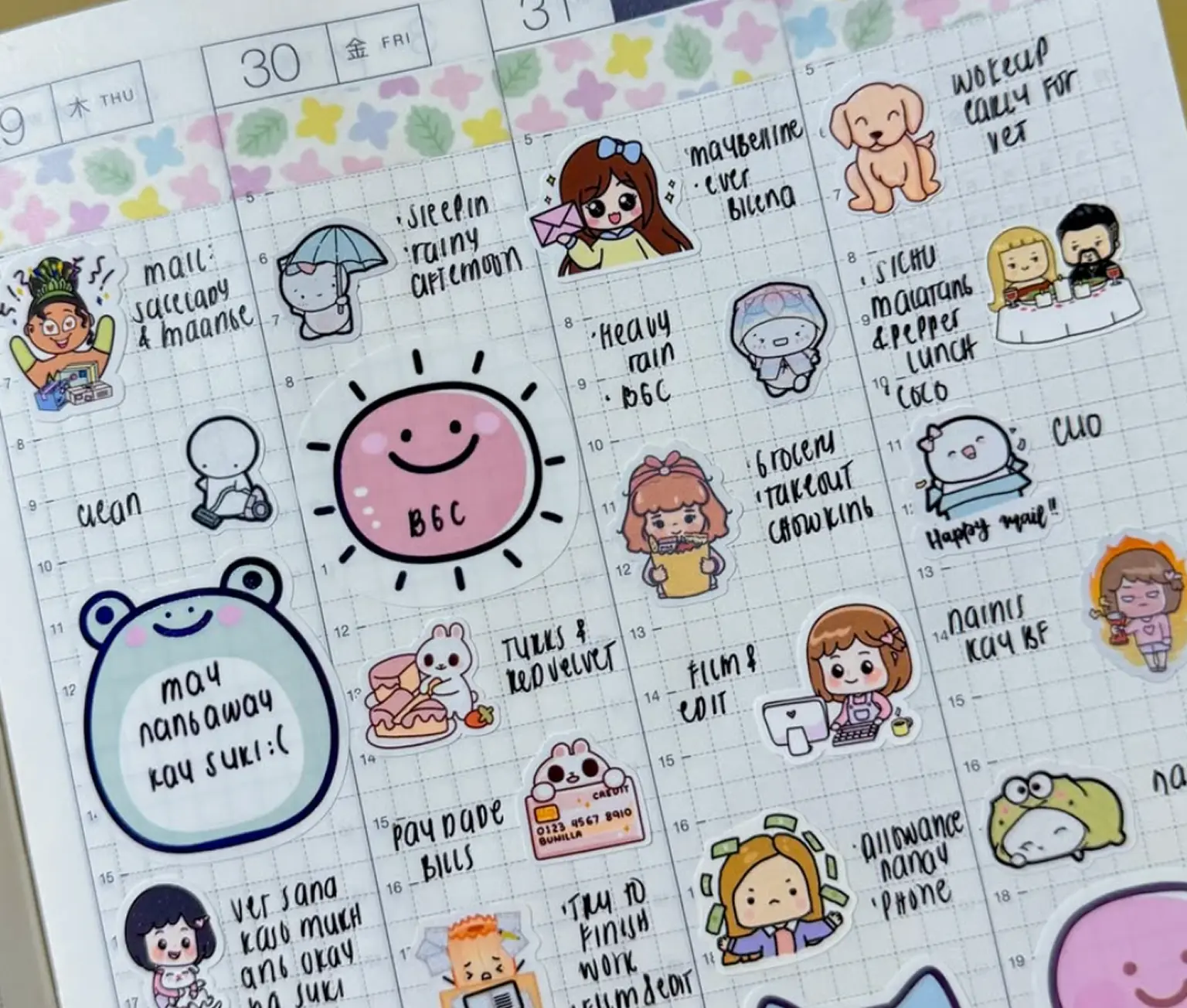 A 'Staying Cozy' stationery subscription box and its contents, including sticker sheets, notepads, and washi tape.