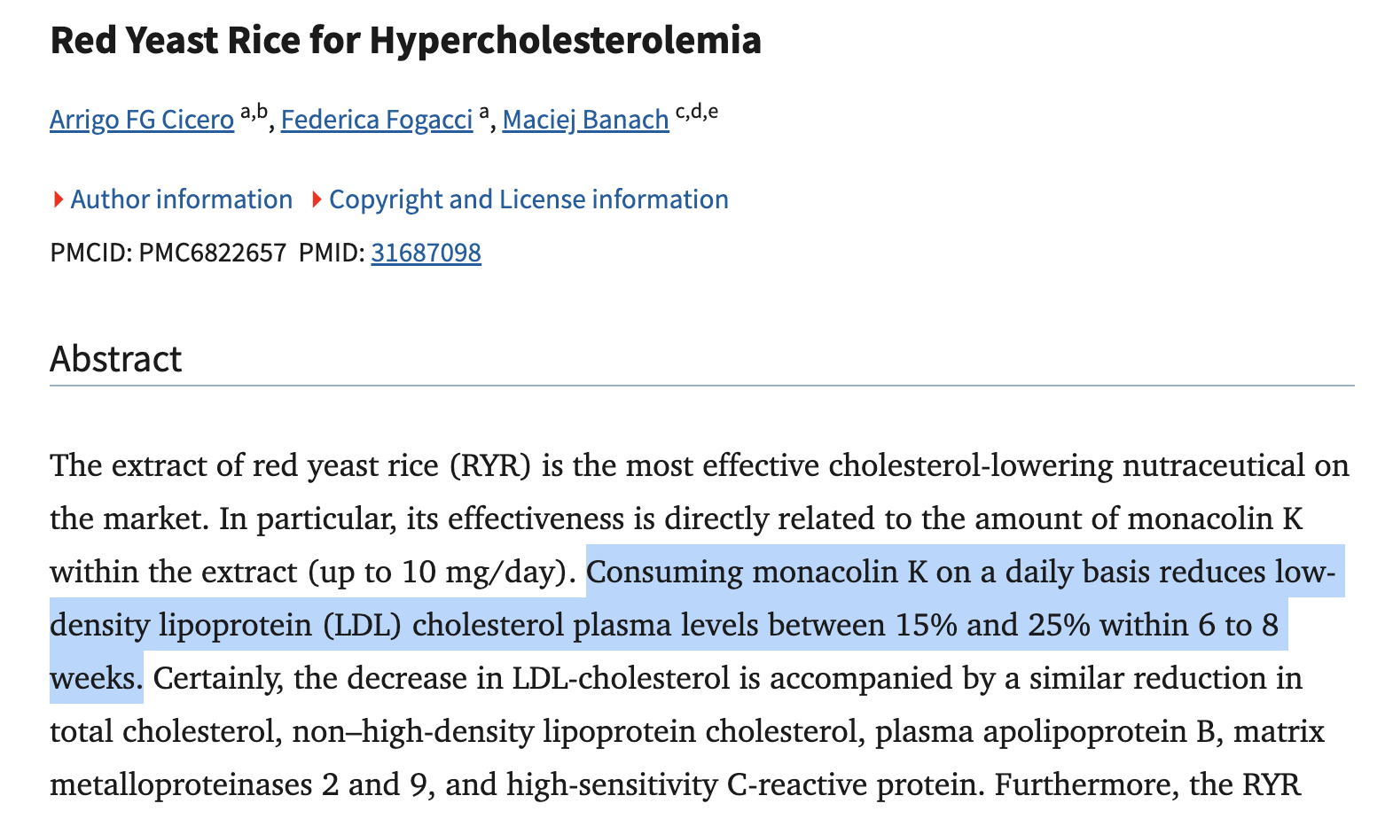 Person wearing green striped socks standing on a wooden floor indoors.
