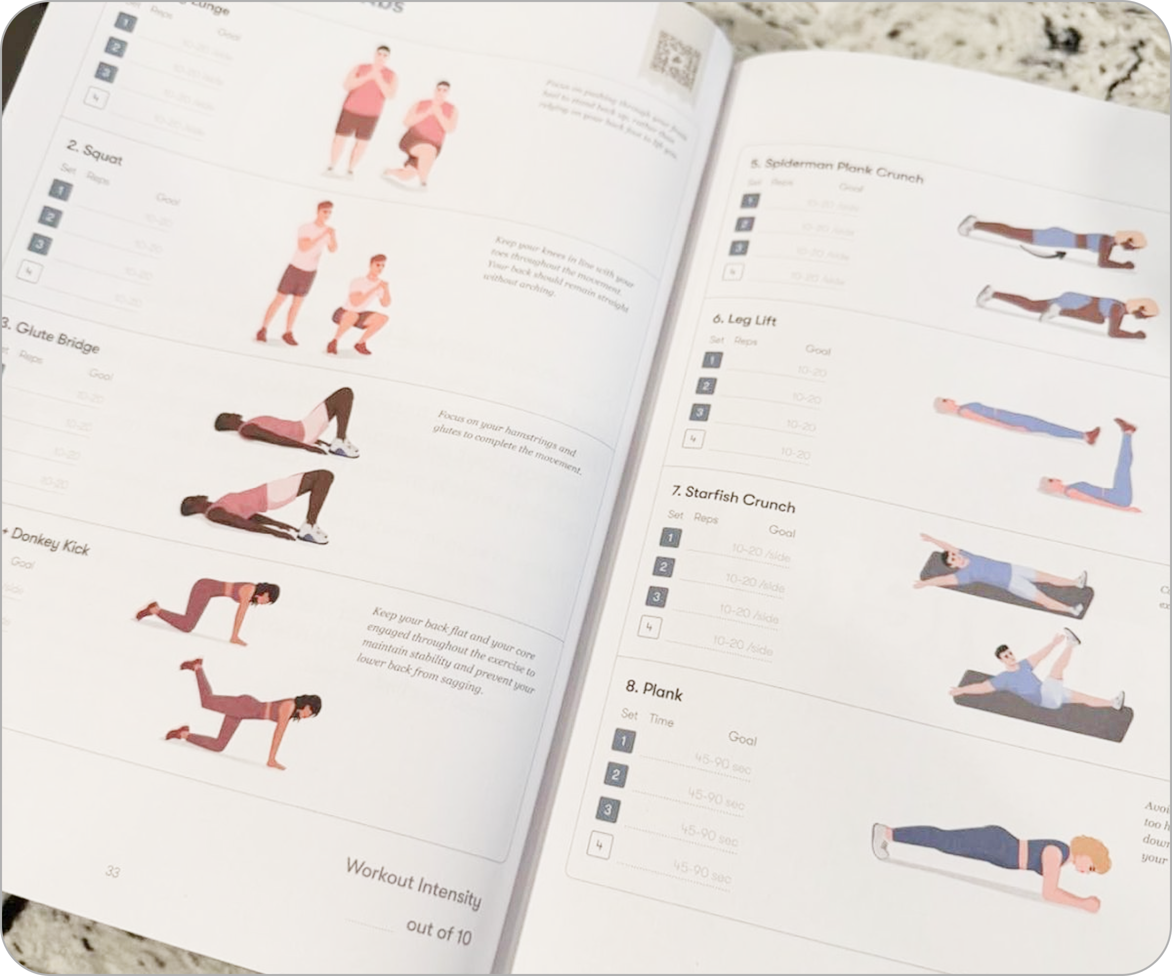 Open exercise guidebook showing illustrated workout routines and instructions.