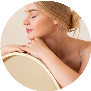 Person with closed eyes resting chin on hands, holding a circular mirror.