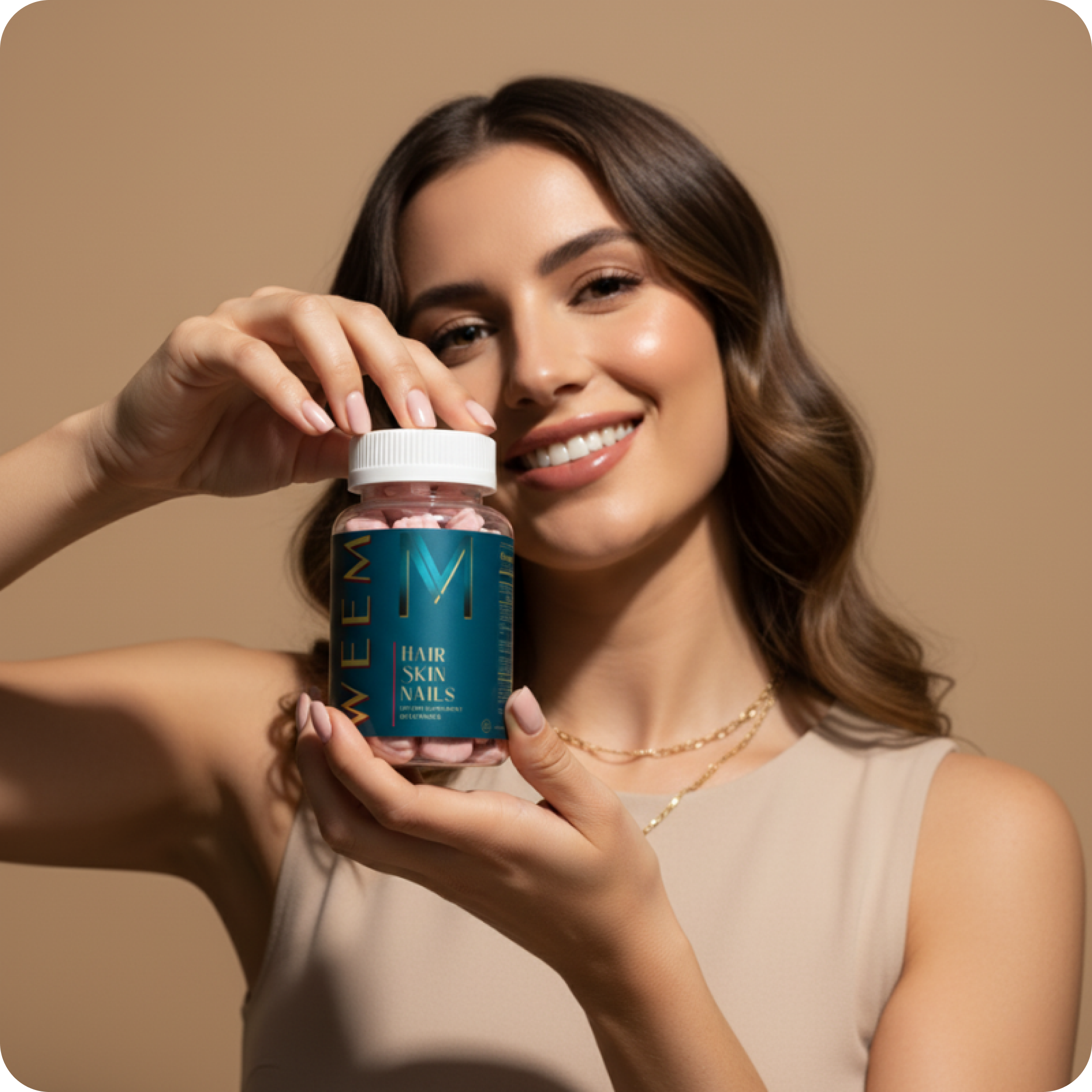 Smiling person holding a bottle labeled 'Hair Skin Nails' against a beige background.