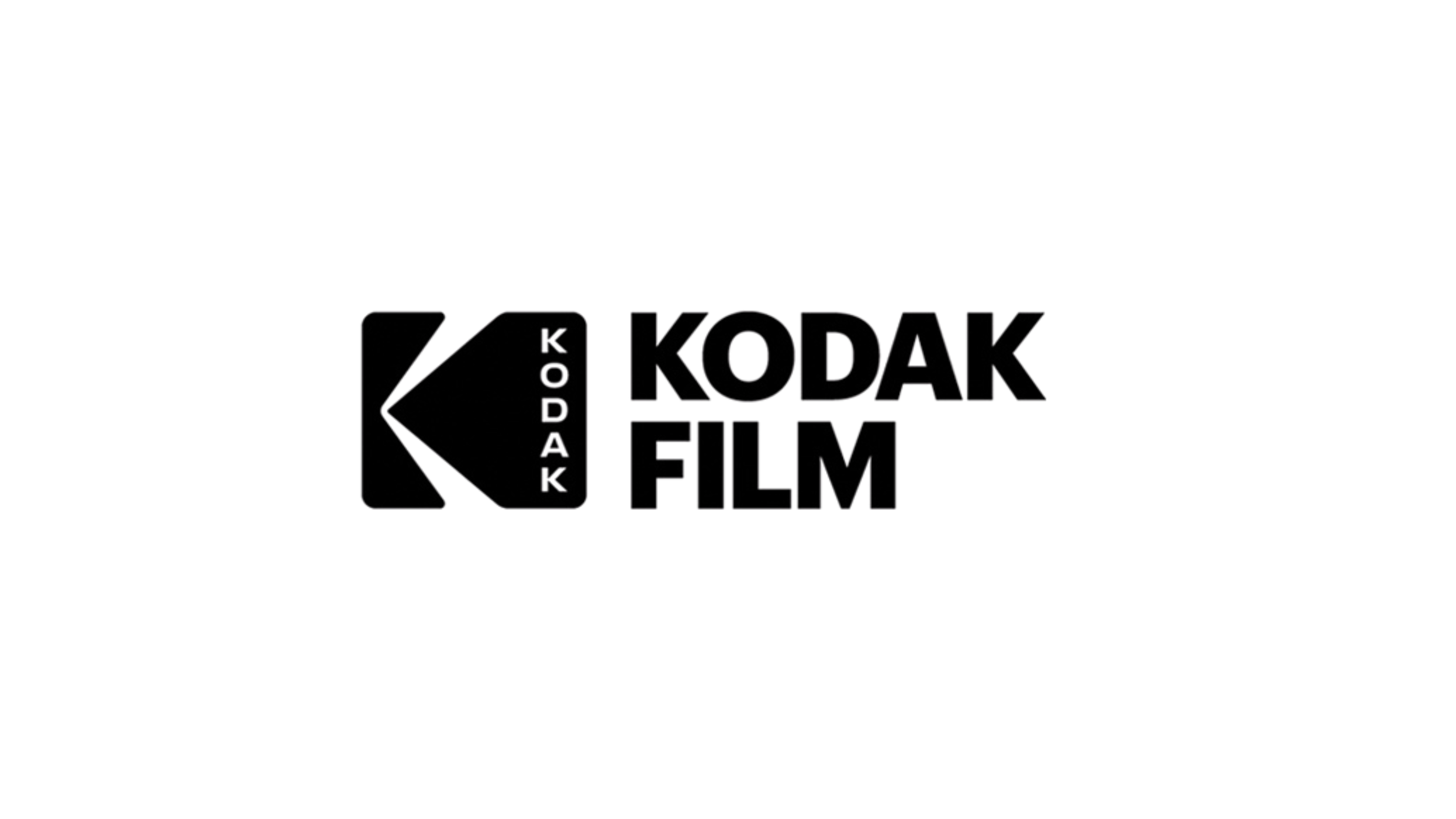 Black and white Kodak Film logo on a transparent background.