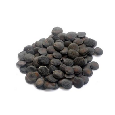 A pile of dark, round seeds on a white background.