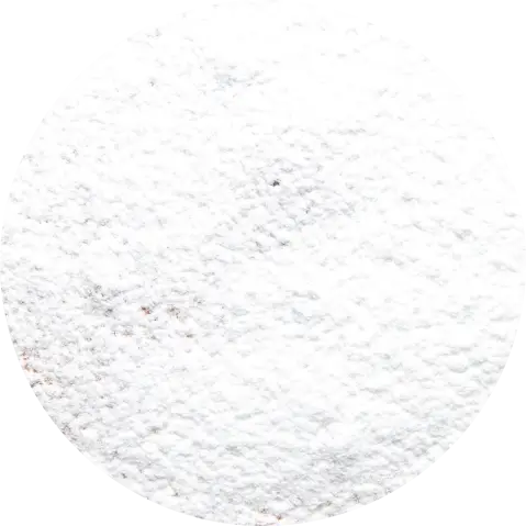 Circular image of a white, powdery texture.