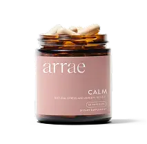 A jar labeled 'arrae CALM' filled with capsules.