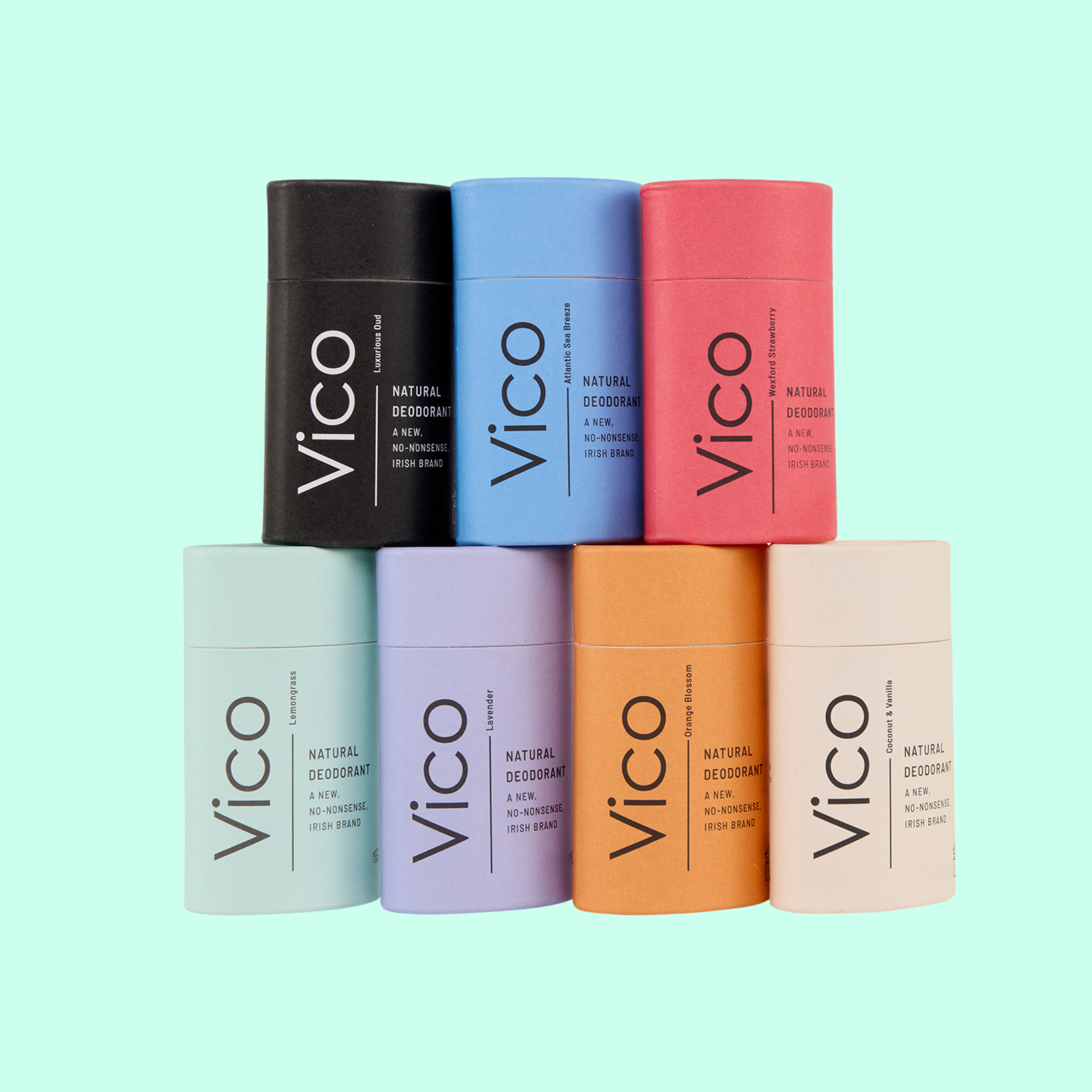 Seven colorful tubes of Vico Natural Deodorant arranged in two rows against a light green background.