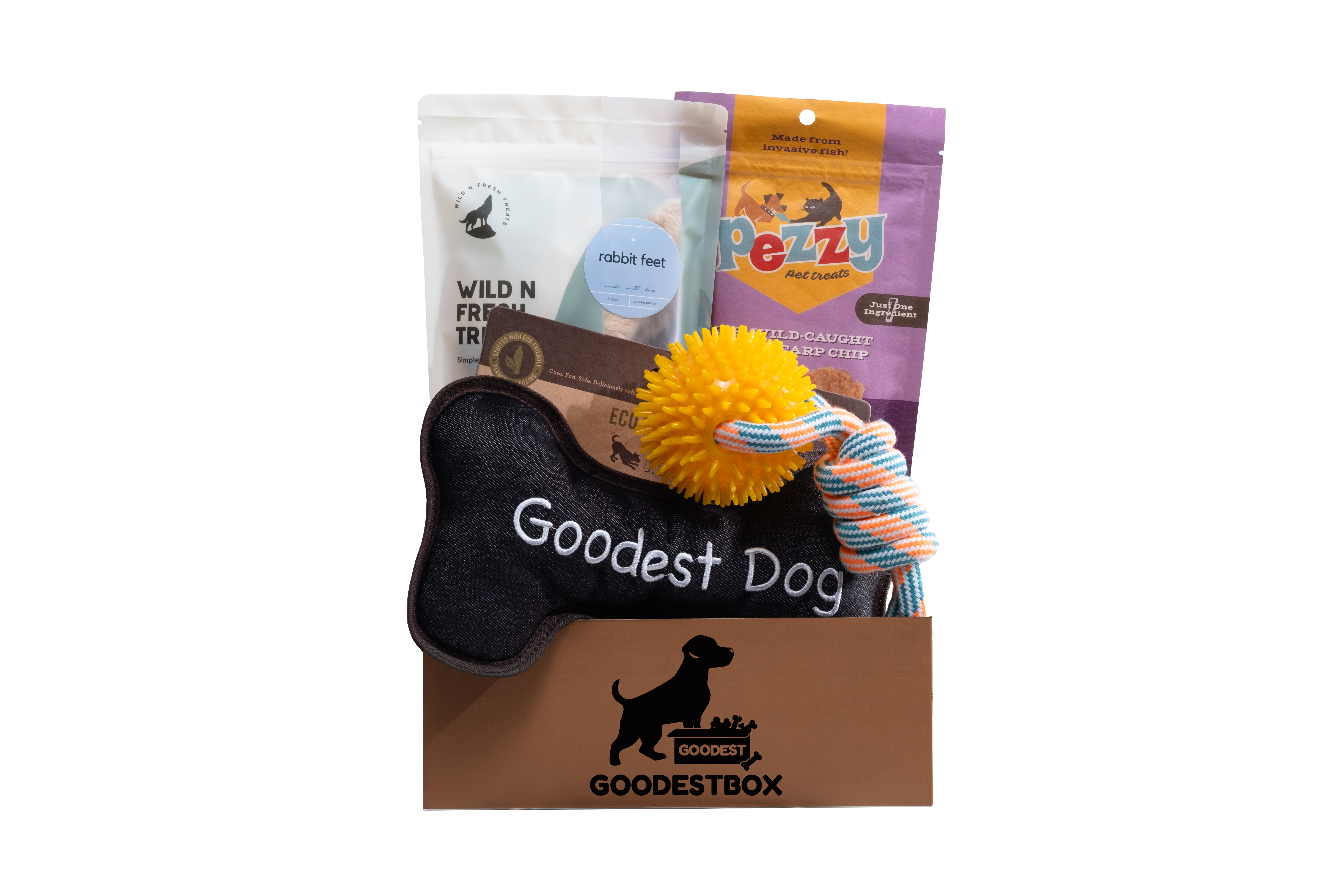 Open box with dog treats and toys, labeled 'Not Just Good - The Goodest.'
