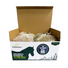 Open box with two bags of equine supplements.