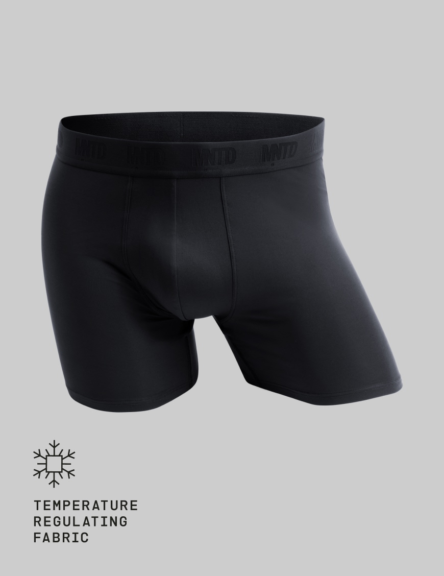 A pair of black MNTD boxer briefs shown on a plain light grey background.