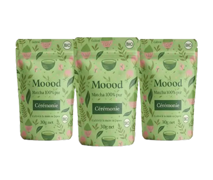Three green pouches labeled 'Moood' with floral designs and 'Cérémonie' text.