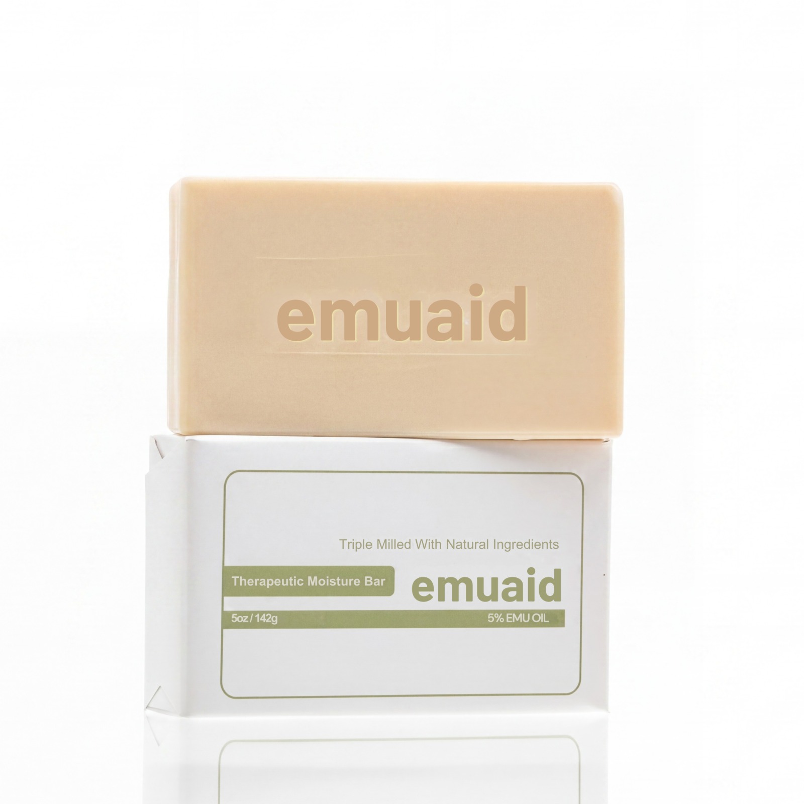 A bar of Emuaid Therapeutic Moisture Bar soap sitting on top of its white and green packaging.