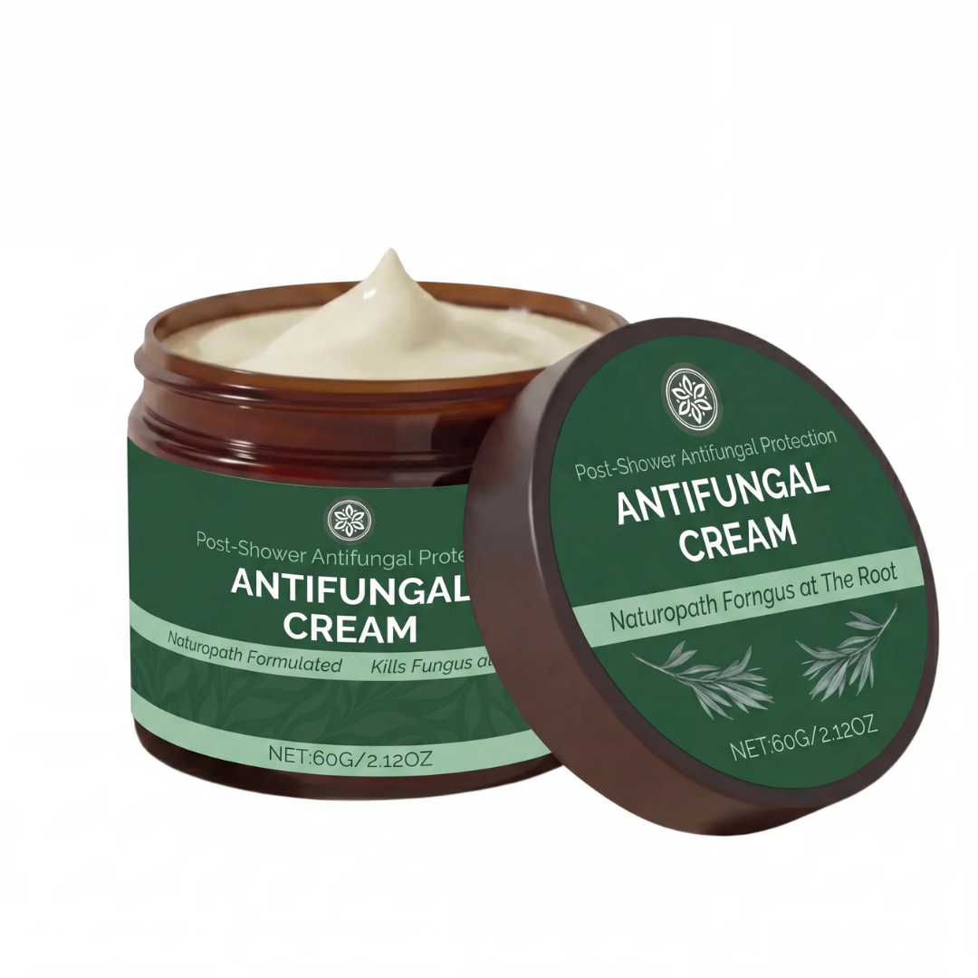 An open jar of Antifungal Cream with the lid leaning against it on a white background.