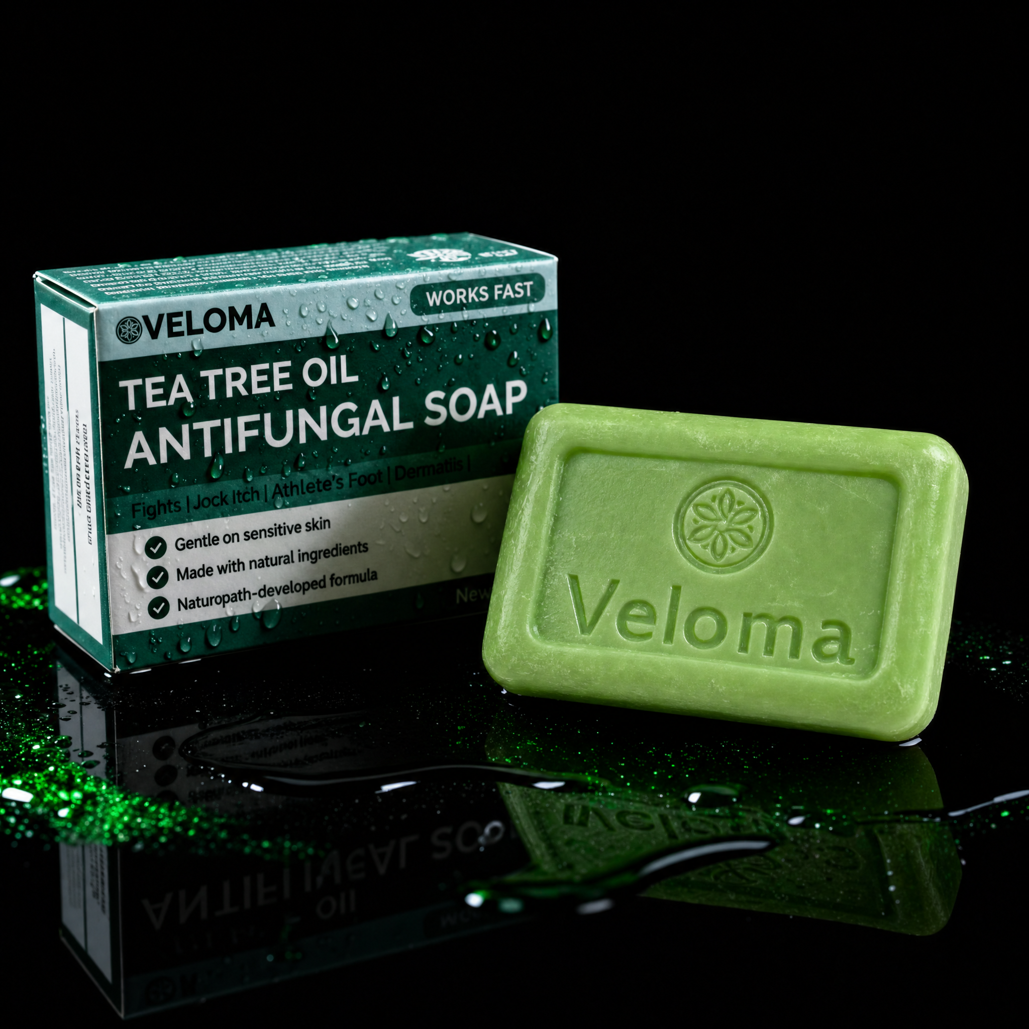 A bar of Veloma Tea Tree Oil Antifungal Soap next to its packaging on a wet, reflective surface.