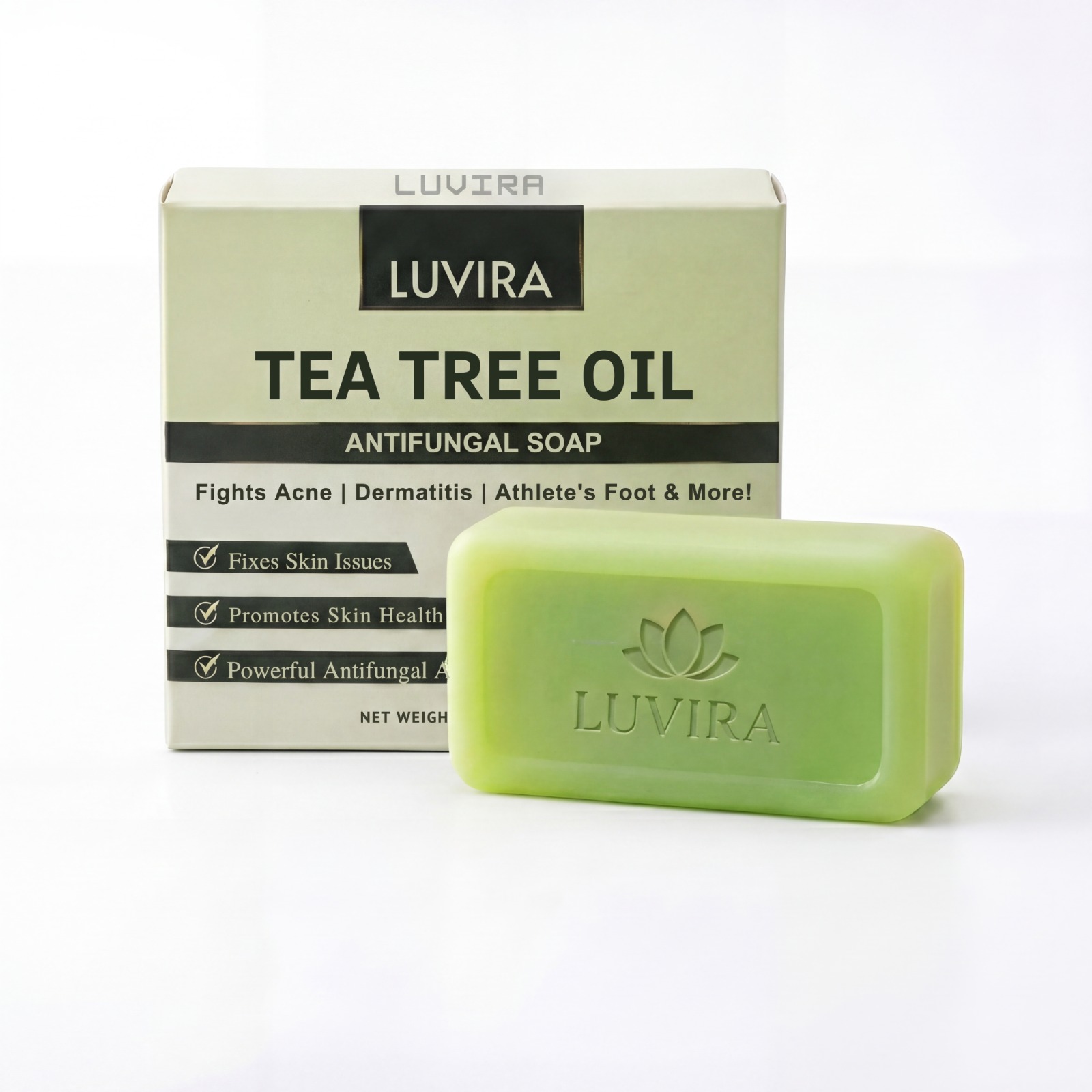 A bar of Luvira Tea Tree Oil Antifungal Soap next to its light green and black box.