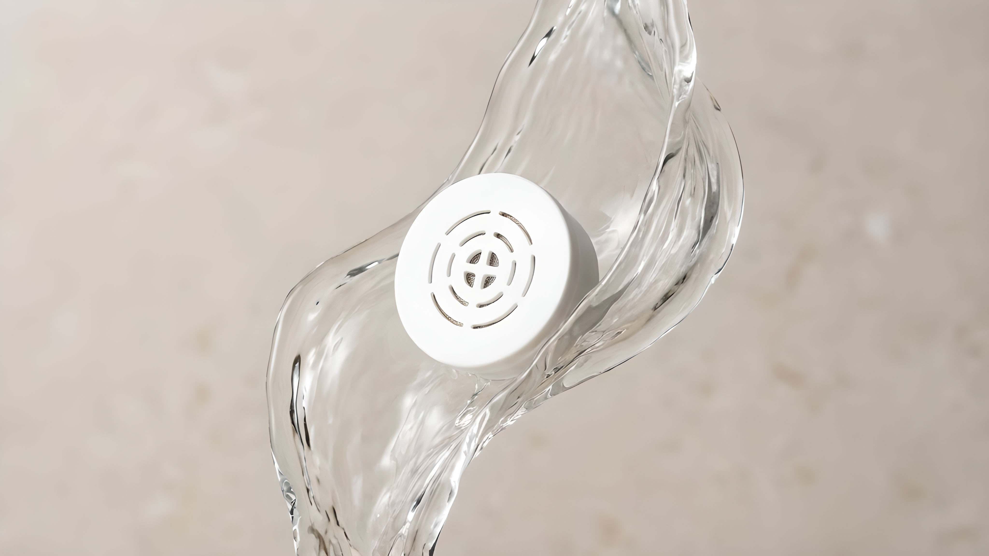 White round object surrounded by flowing water.