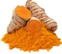 Turmeric roots and powder on a white background.