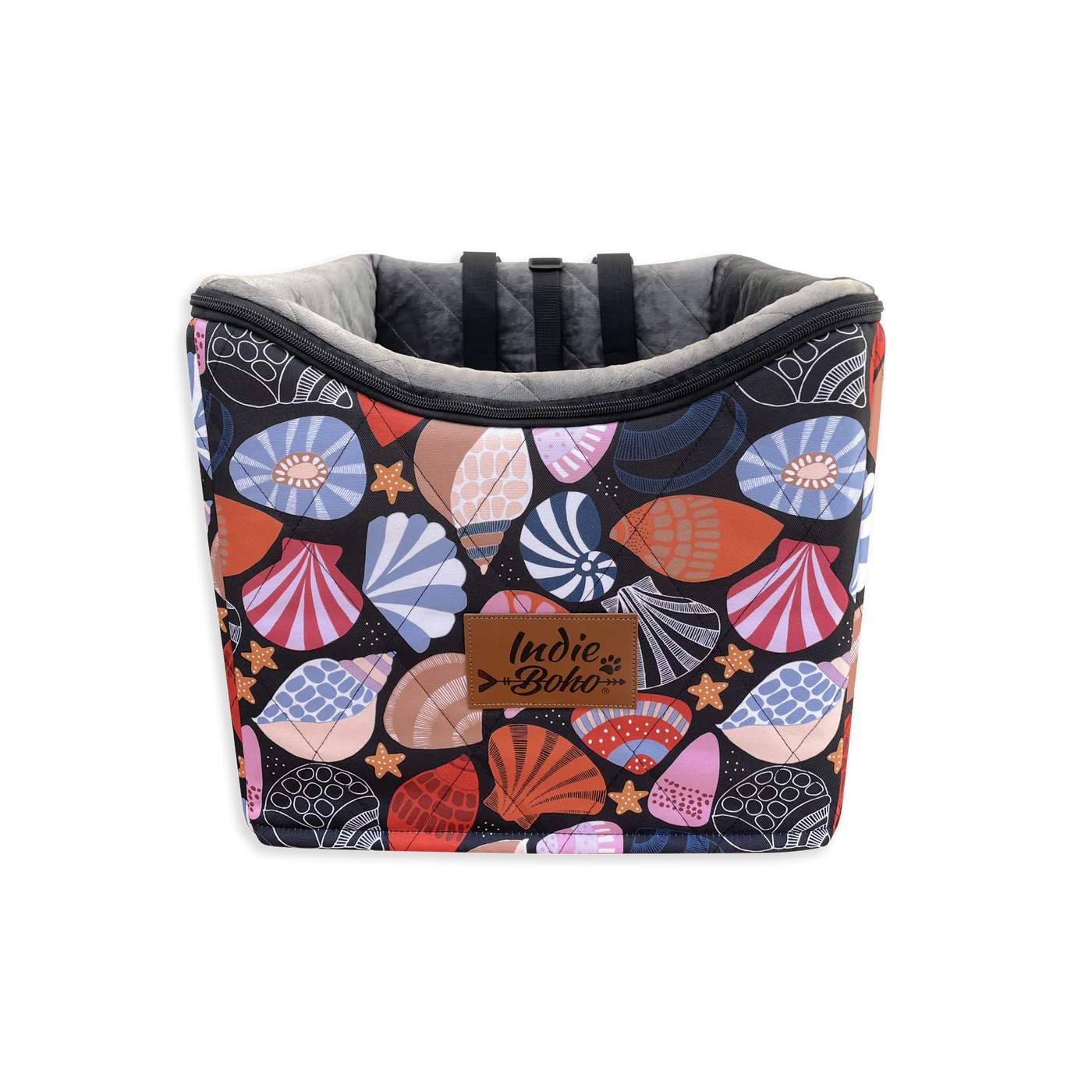 Colorful pet carrier with seashell pattern and 'Indie Boho' label.