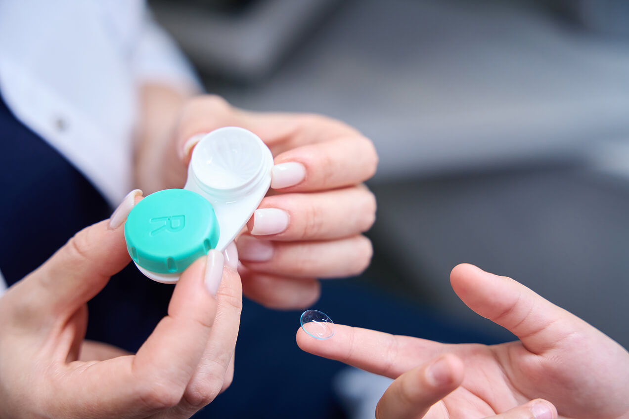 Patient doing a contact lens fitting with a professional