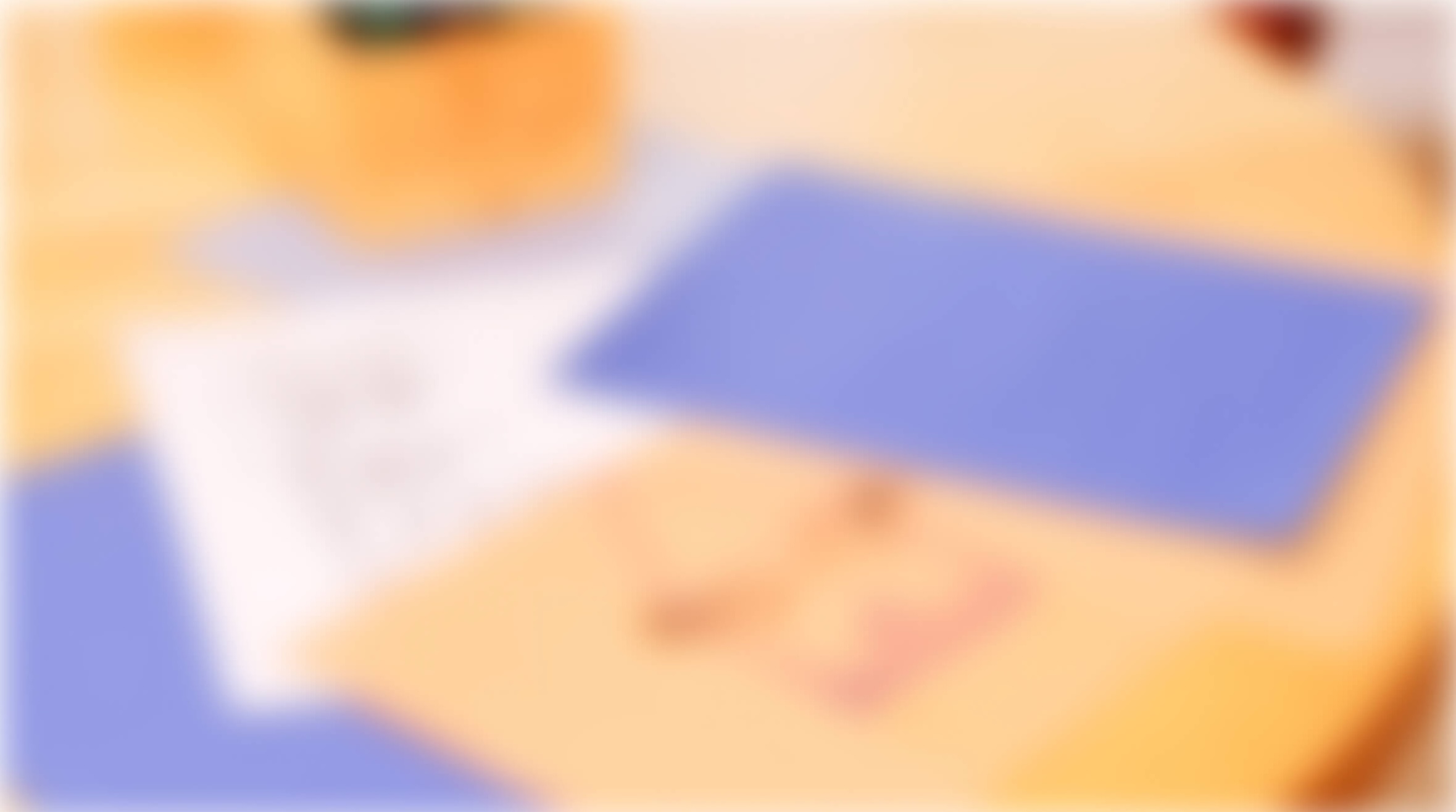 Blurry image with indistinct shapes and colors.