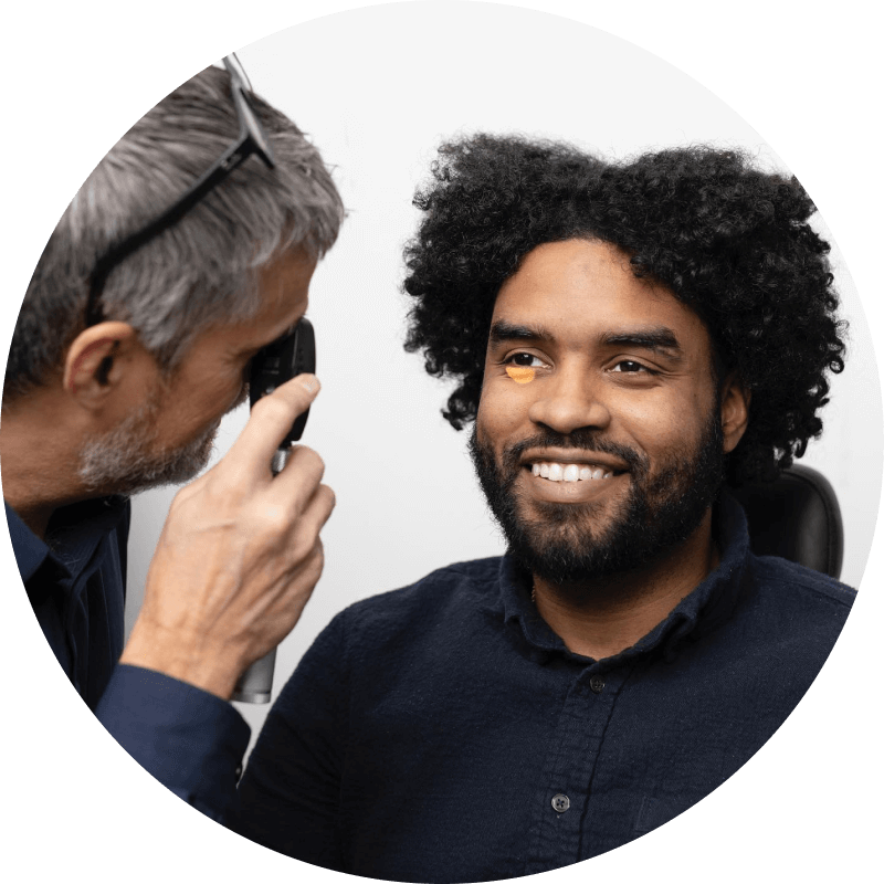 Man doing a dry eye exam test with an optometrist