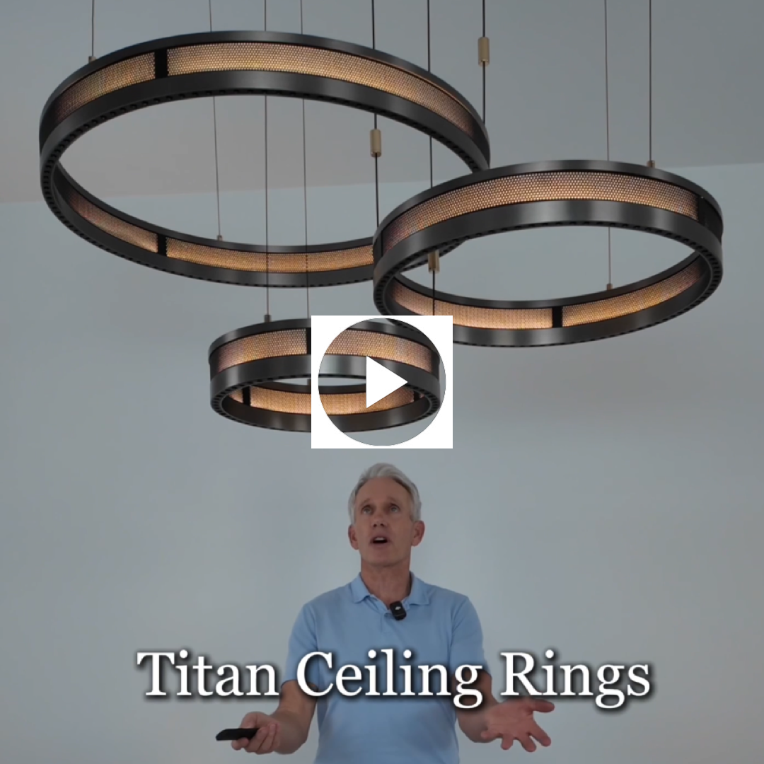 Three circular pendant lights with perforated metal design.