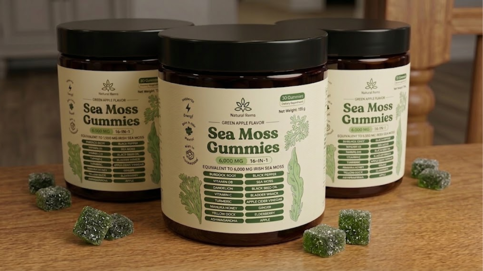 Three jars of Natural Rems Sea Moss Gummies on a wooden table with several gummies scattered around them.