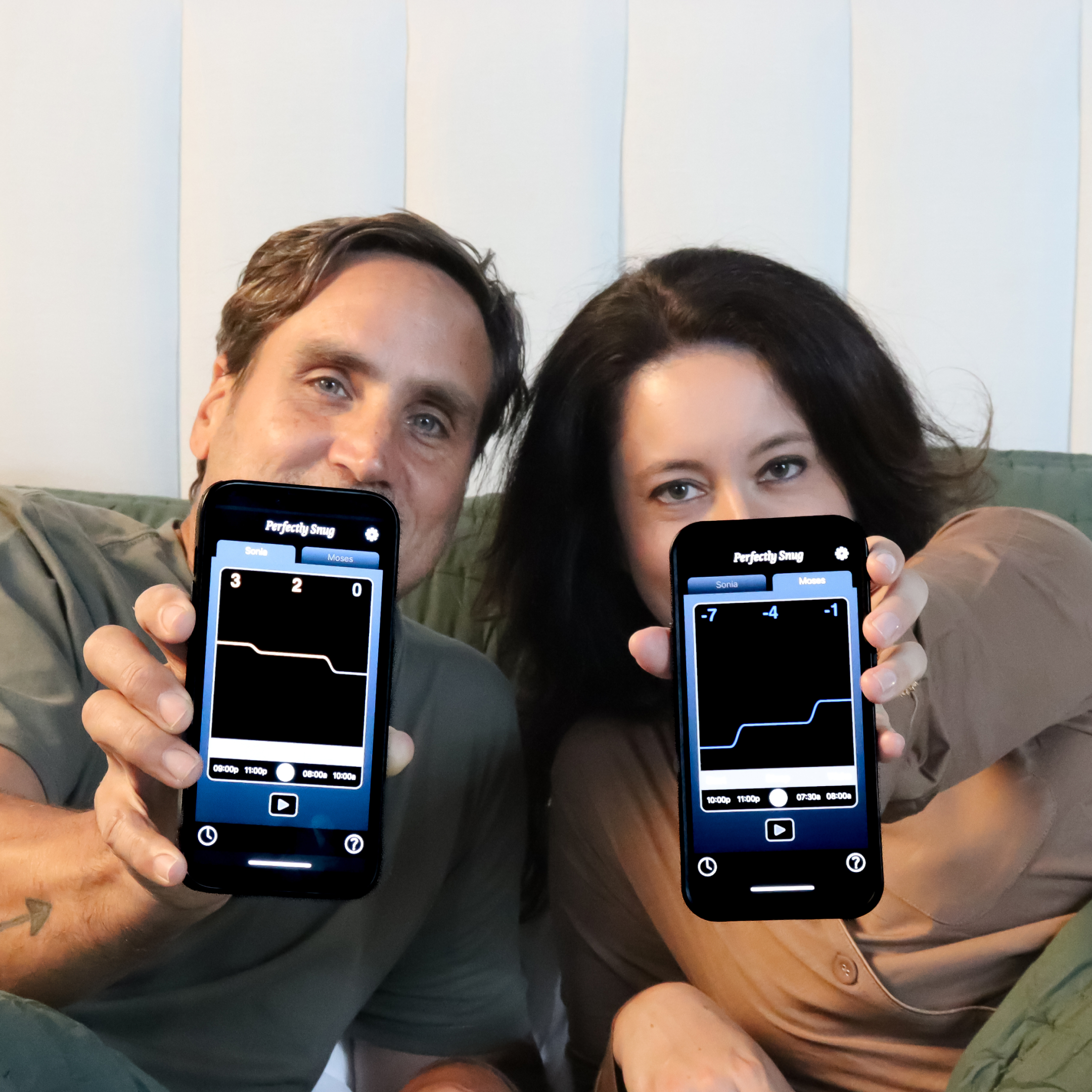 Two people holding smartphones with graph-like displays.